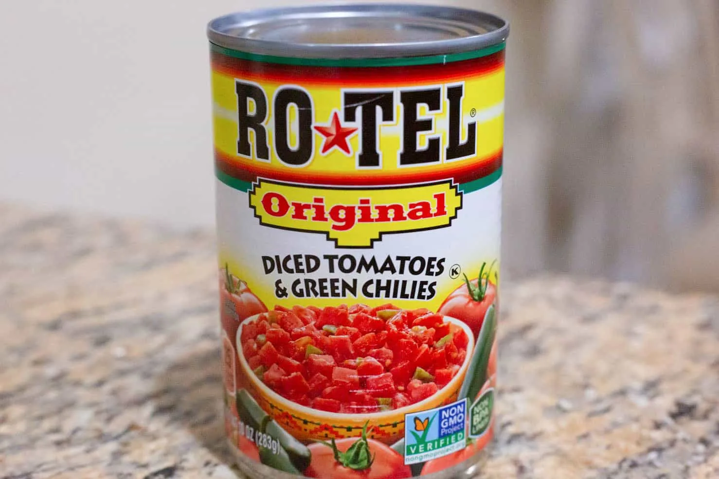 A colorful can of Rotel diced tomatoes and green chiles.