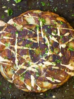 Rustic Potato Cake displayed attractively with garnishes