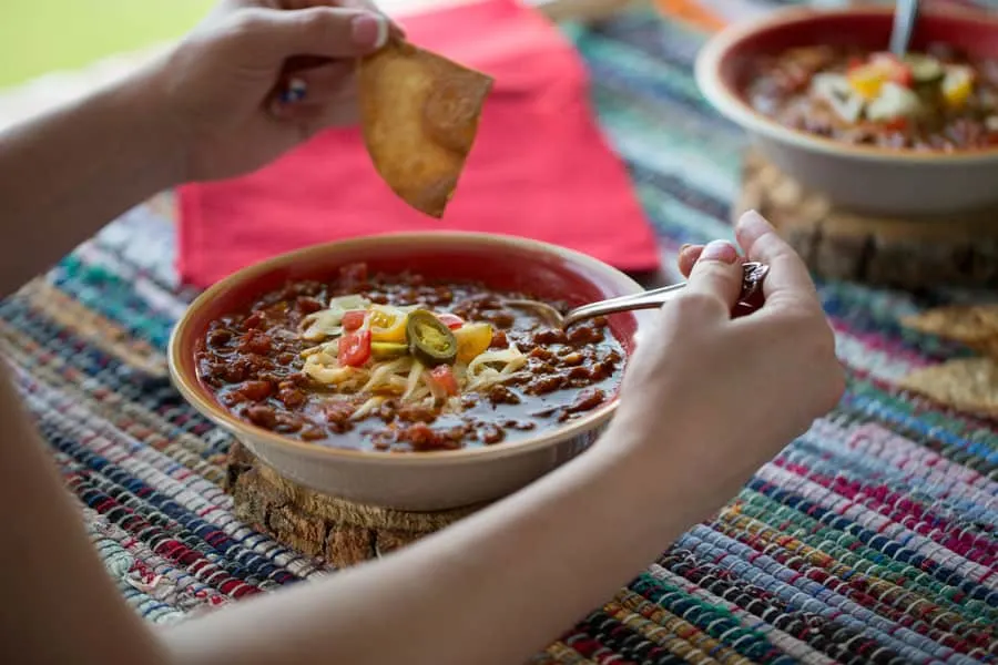 Homemade Texas Taco Soup with cheese, jalapenos, chips