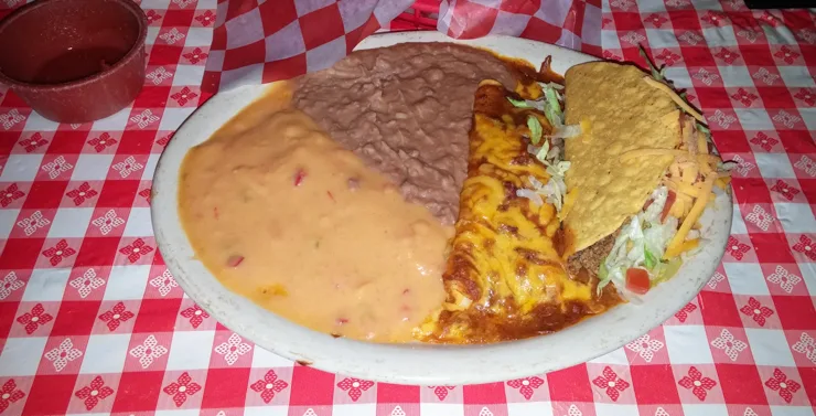 Candlelite Inn's Special Mexican Dinner - A plate of enchiladas and tacos 