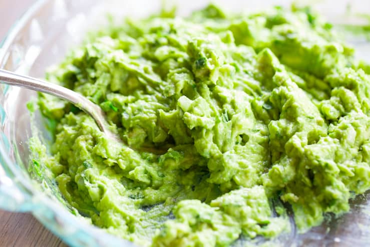 A bowl of handmade Torchy's Guacamole from Urban Cowgirl