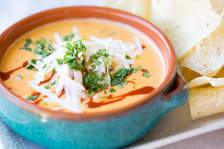 Torchy's Queso in a bowl with chips 