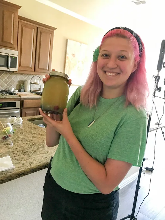 New intern Bethany displays her fizzy fishbowl in a mason jar