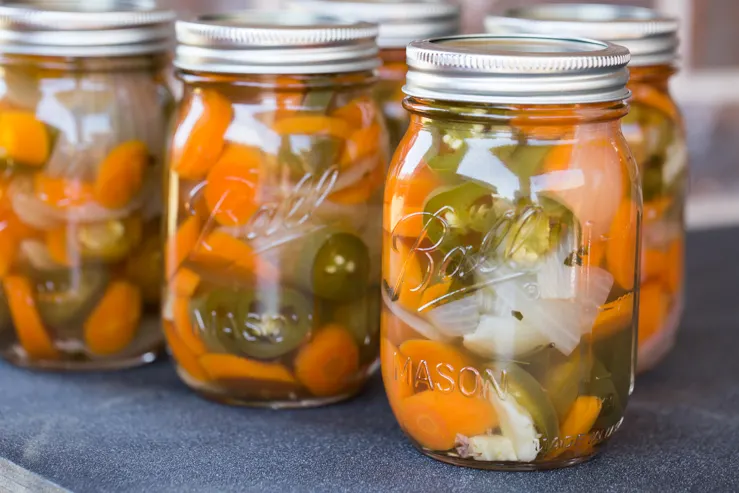 Jars of escabeche, just canned in the sunlight 