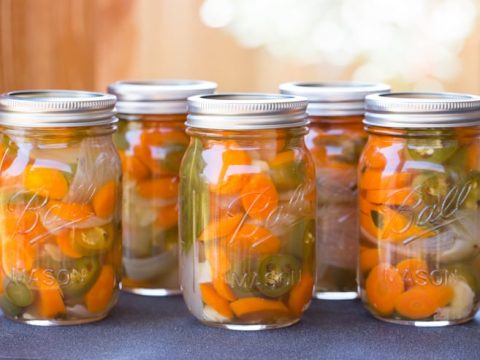 Jars of Texas Escabeche in the sunshine