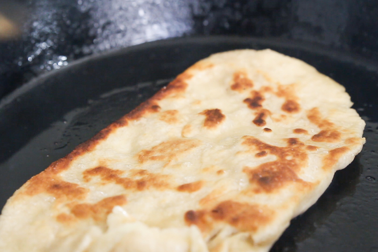 Delicious fried bacon fat tortilla with golden brown bubbles