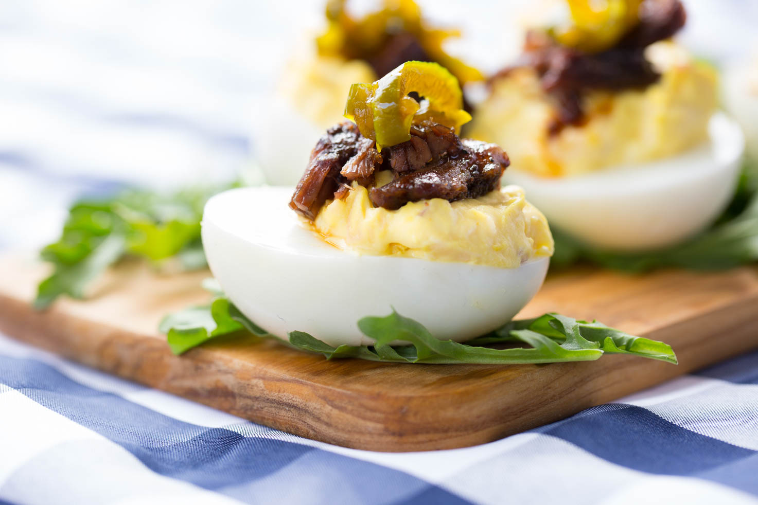 Brisket Deviled Eggs on a platter at a picnic 