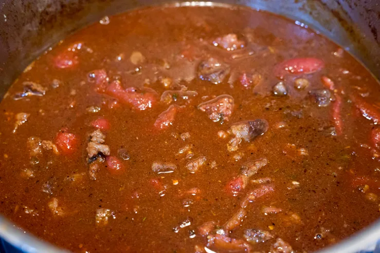Pot of chili beginning to cook