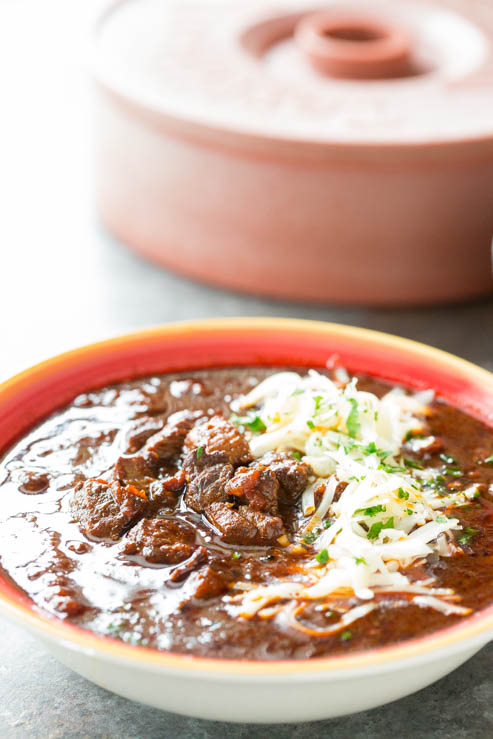 A beautiful bowl of texas brisket chili and cheese