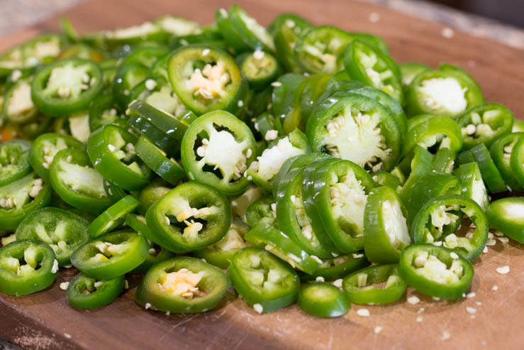 Sliced coins of jalapeno preparing to make cowboy candy 