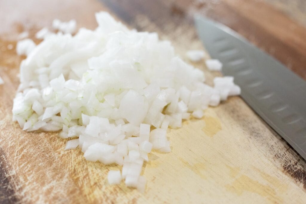 Chopped white onion for refried beans