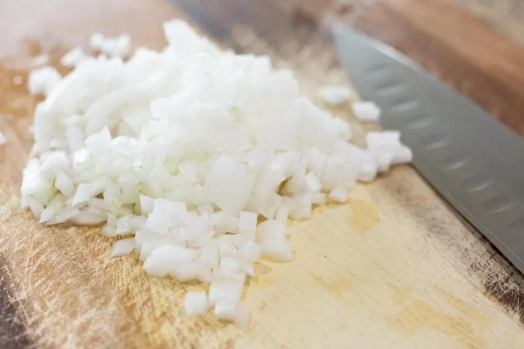 Chopped white onion for refried beans