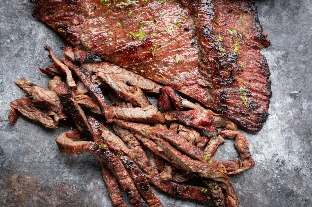 Seared skirt steak fajitas cut horizontally for best results - a demonstration