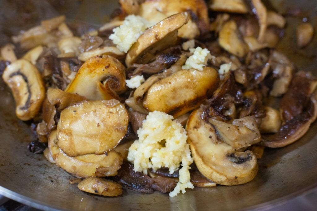 Mushrooms saute with garlic added