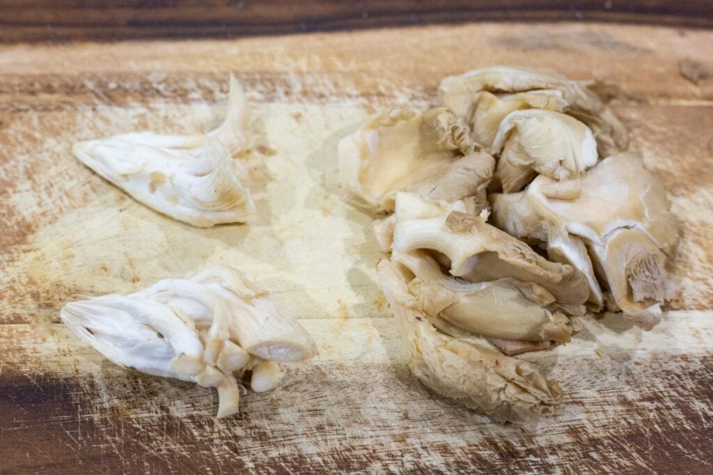 Oyster mushrooms with their stems removed at the base