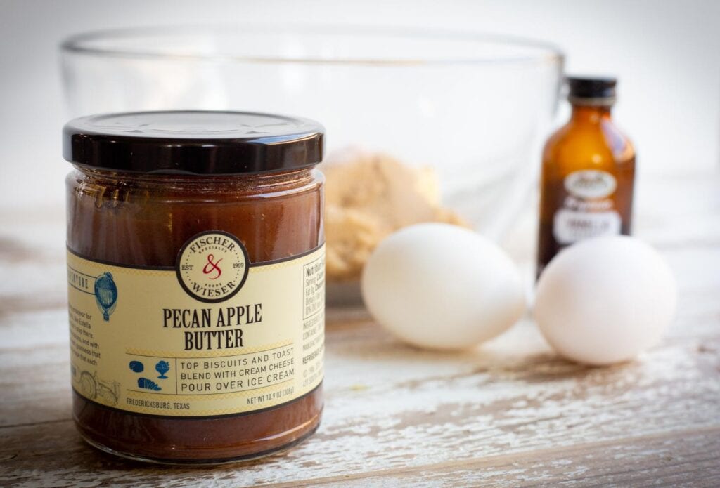 A jar of pecan apple butter made by Fischer & Wieser and the ingredients for apple tarts