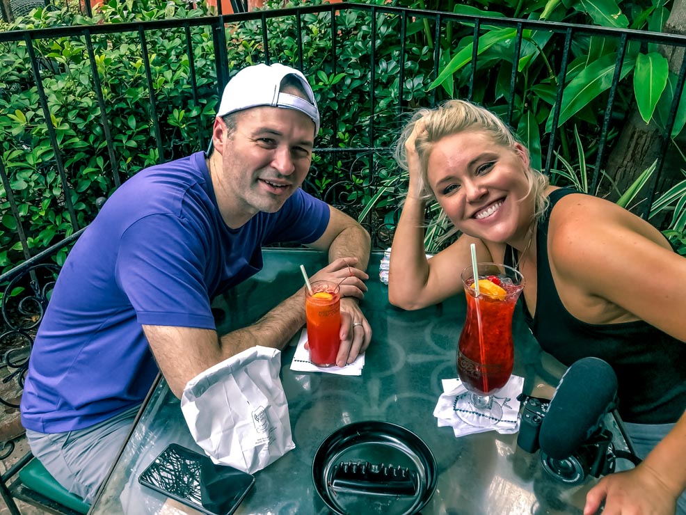 Dereck and Sarah drinking at Pat O'briens on the self guided food tour 