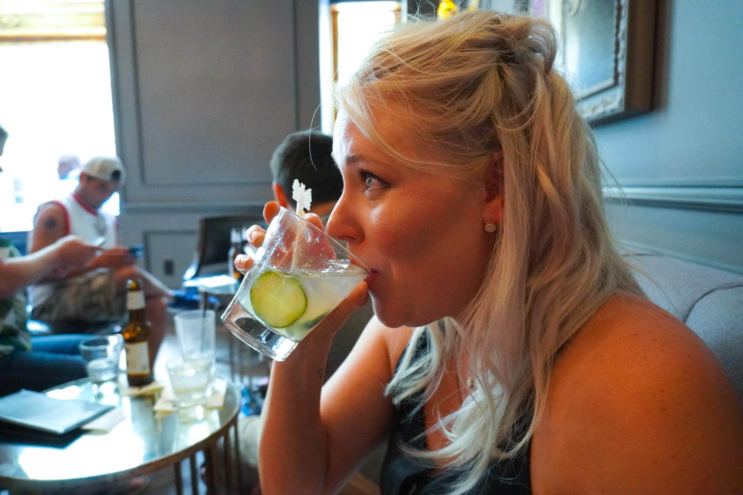 Chef Sarah Penrod sipping a cocktail in New Orleans 