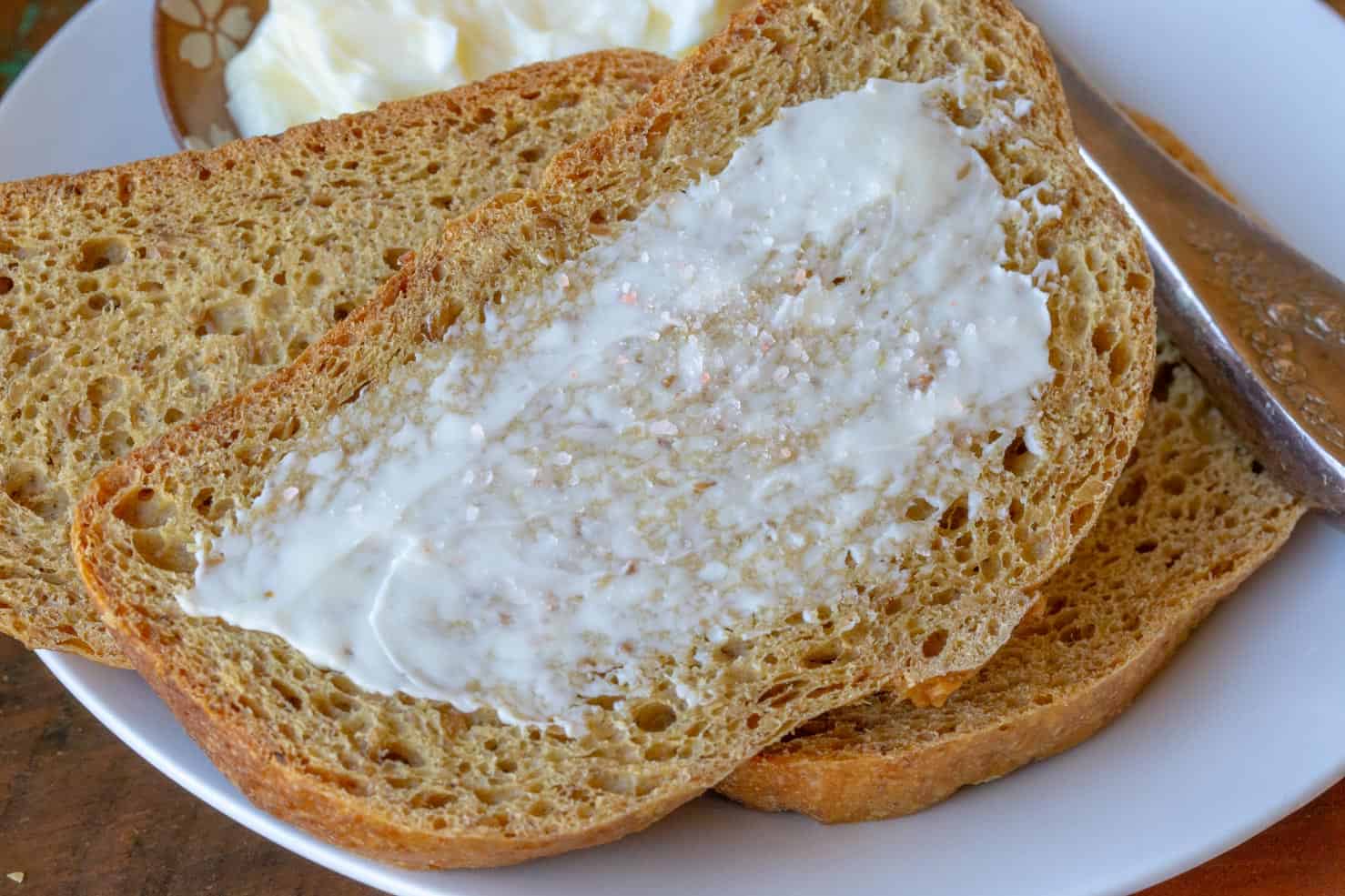 Low Carb Bread on a plate with butter