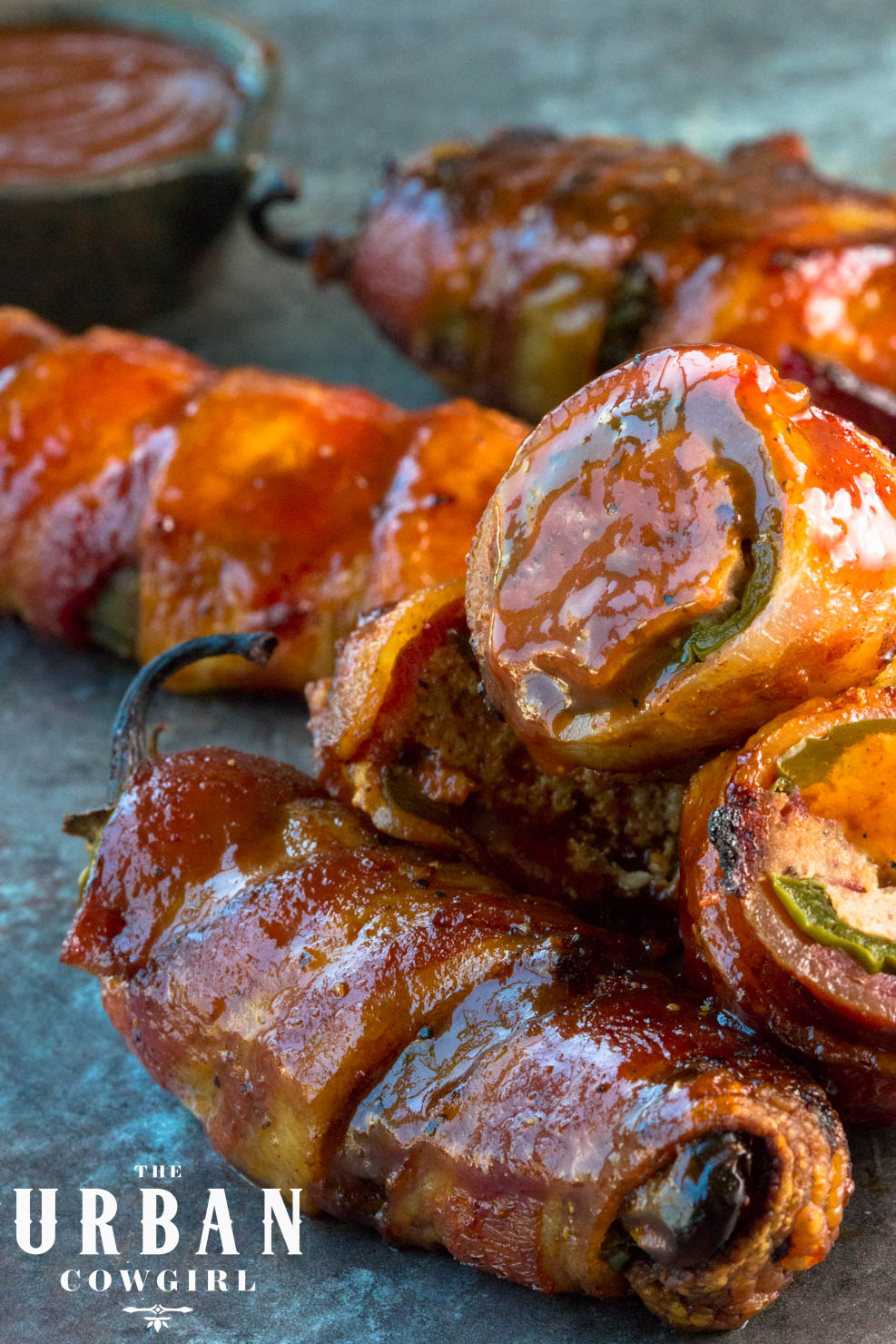 Bacon Wrapped Brisket Stuffed Jalapenos with Barbecue Sauce 