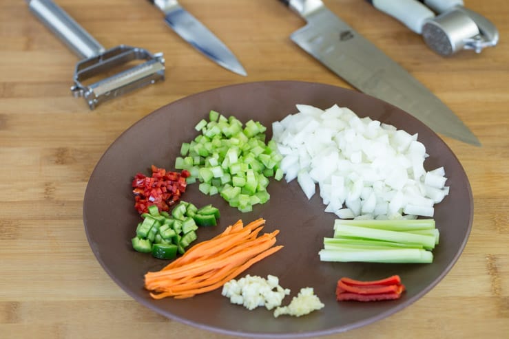 Different styles of chopped veggies, with Japanese knives