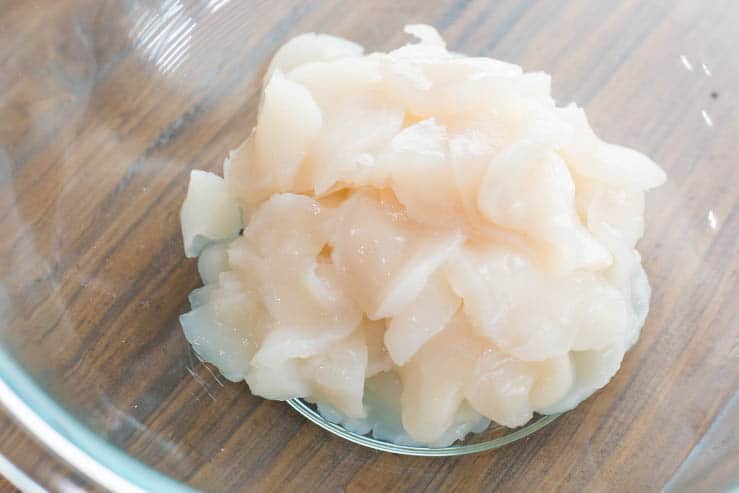 Sliced scallops in a bowl