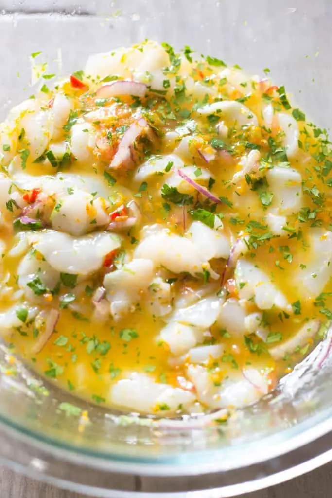 Scallop ceviche marinating with fresh citrus juices