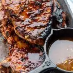 A platter of grilled pork chops with hot honey glaze