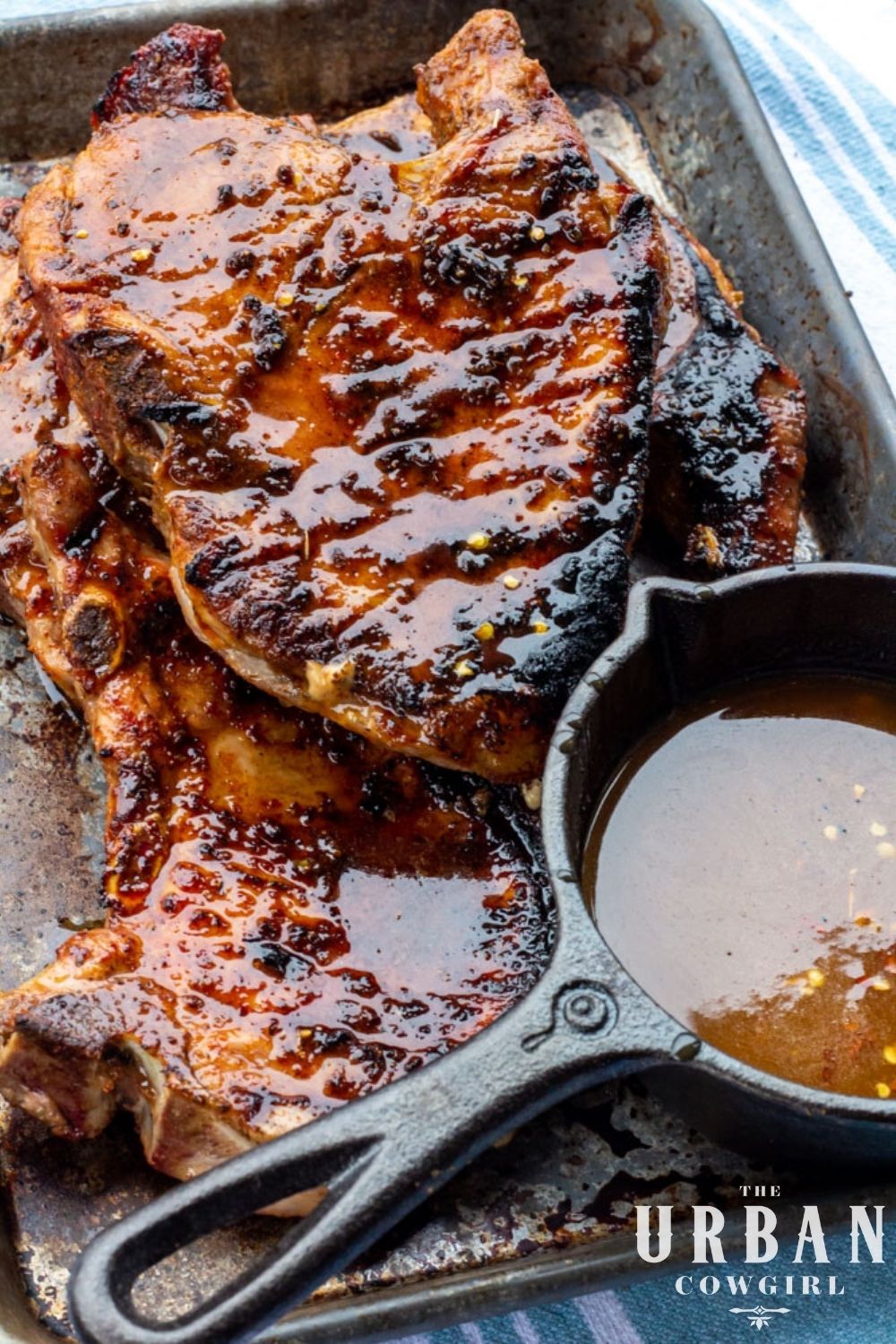 A platter of freshly grilled, glistening pork chops.