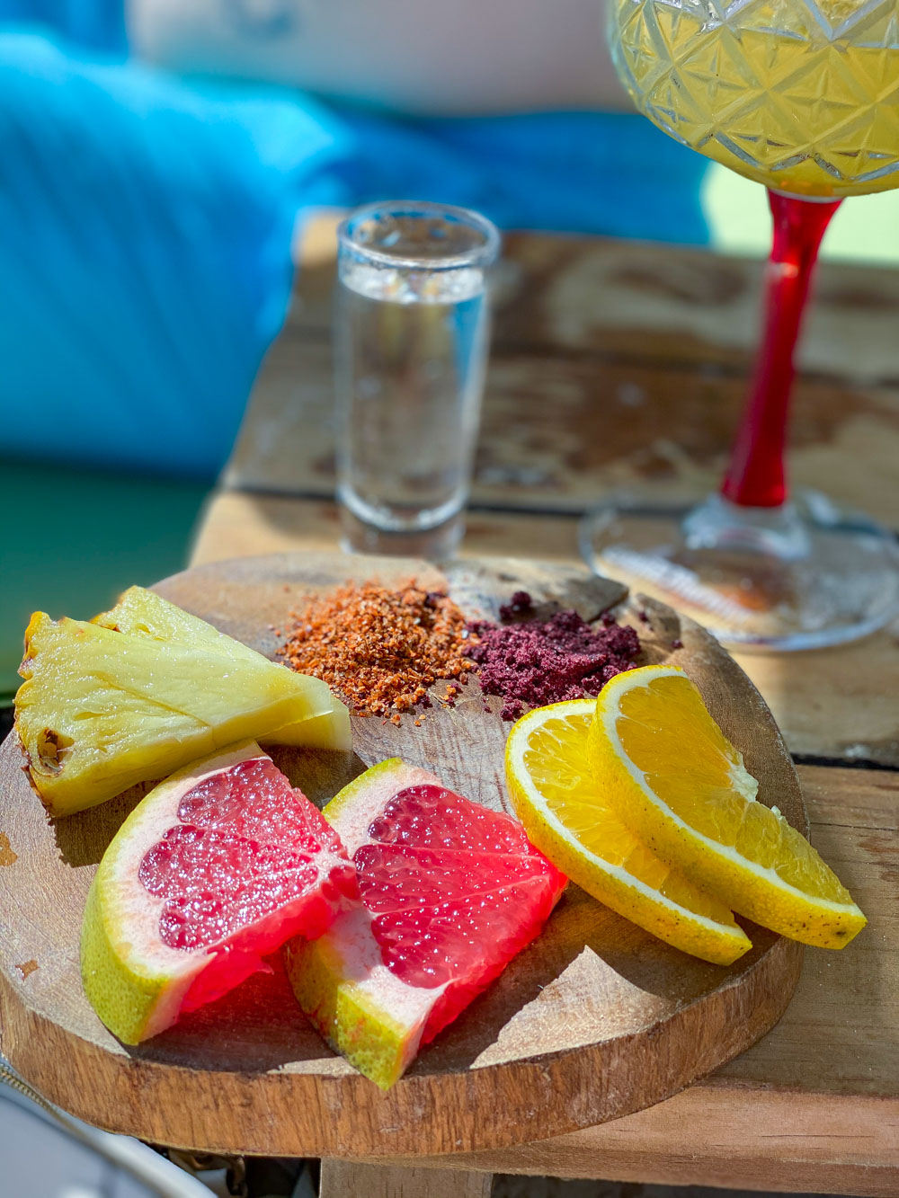 Various fruits and powders for drinking mezcal shots.