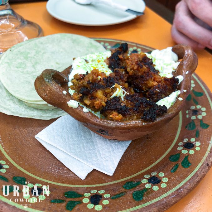 A bowl of cheese and chorizo at a mexican taqueria in Playa Del Carmen.