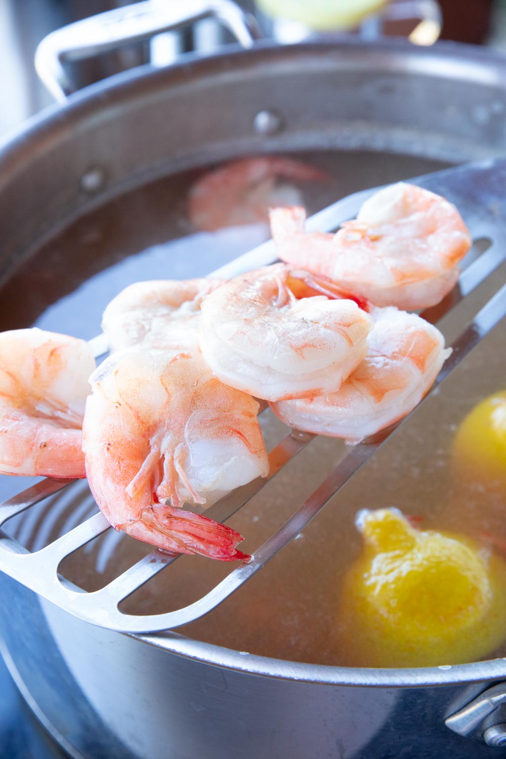 Close up of pink shrimp recently removed from the poaching liquid