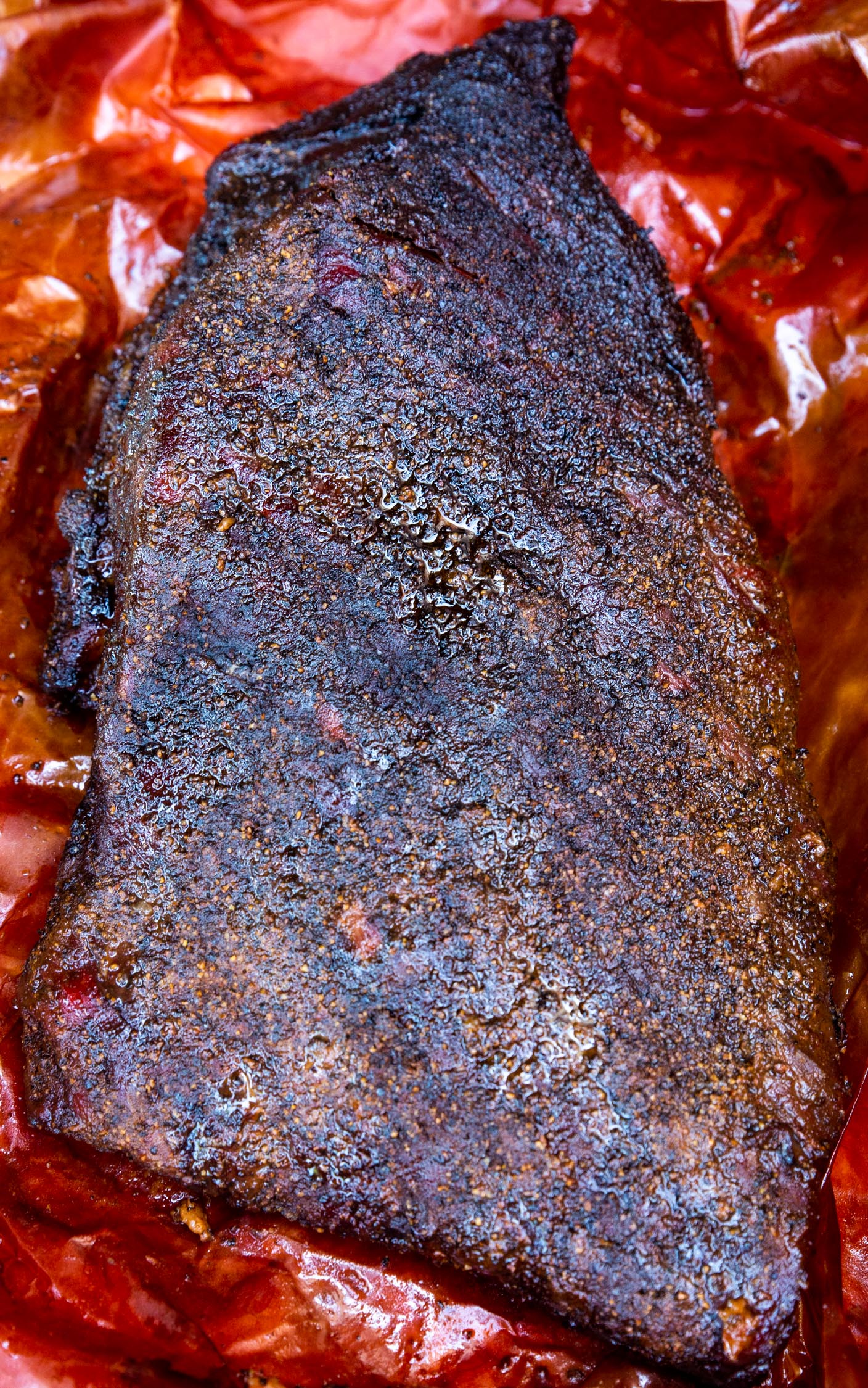 A smoked whole brisket, freshly unwrapped from butcher paper