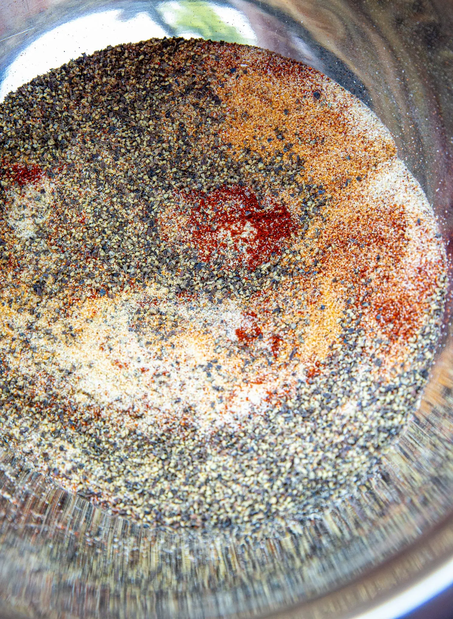 brisket rub ingredients in a bowl before mixing