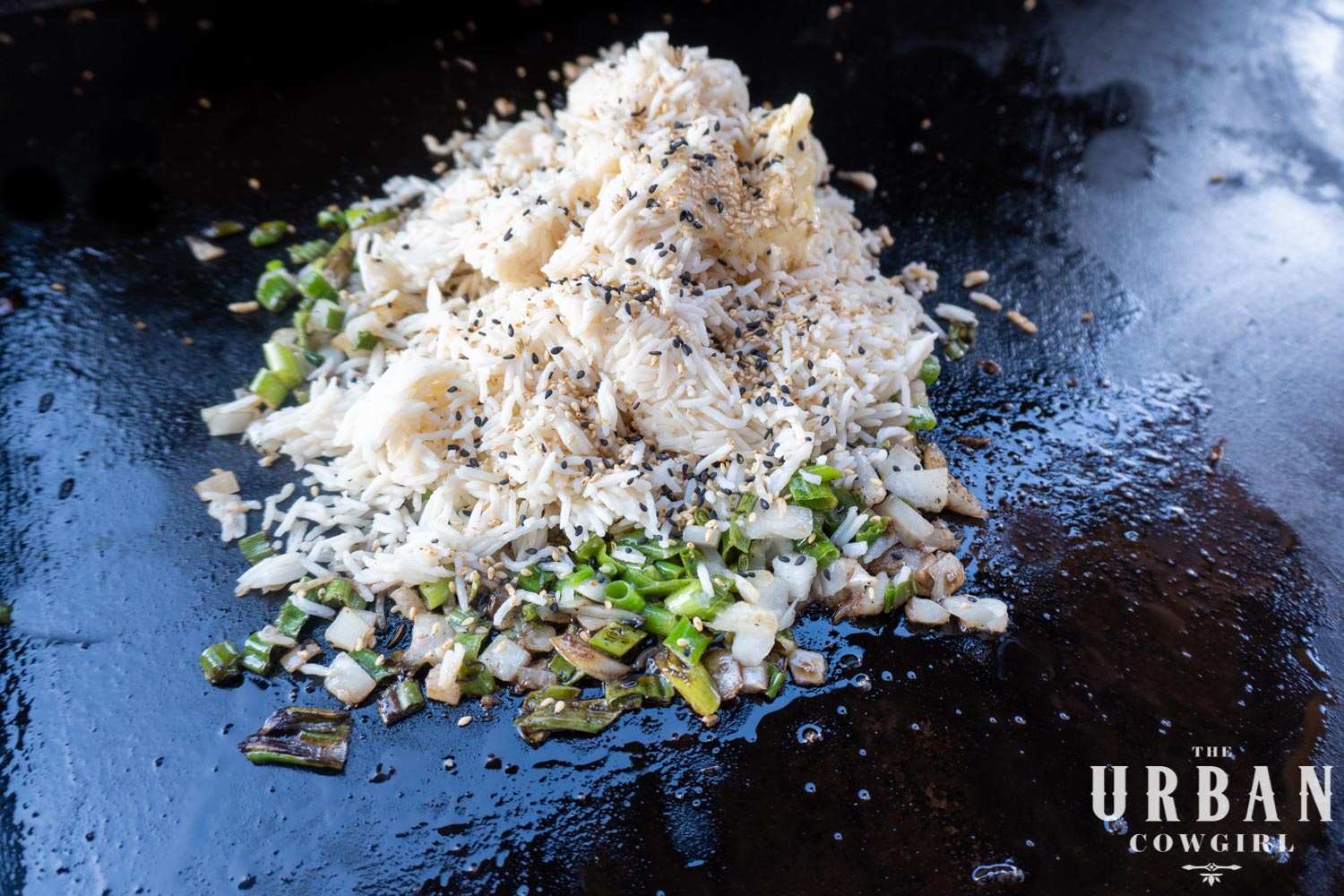 Fried rice ingredients on the blackstone griddle.