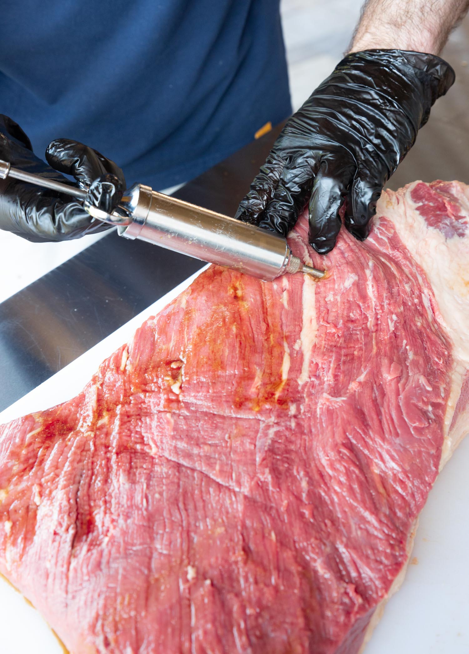 Injecting the fluid into the brisket