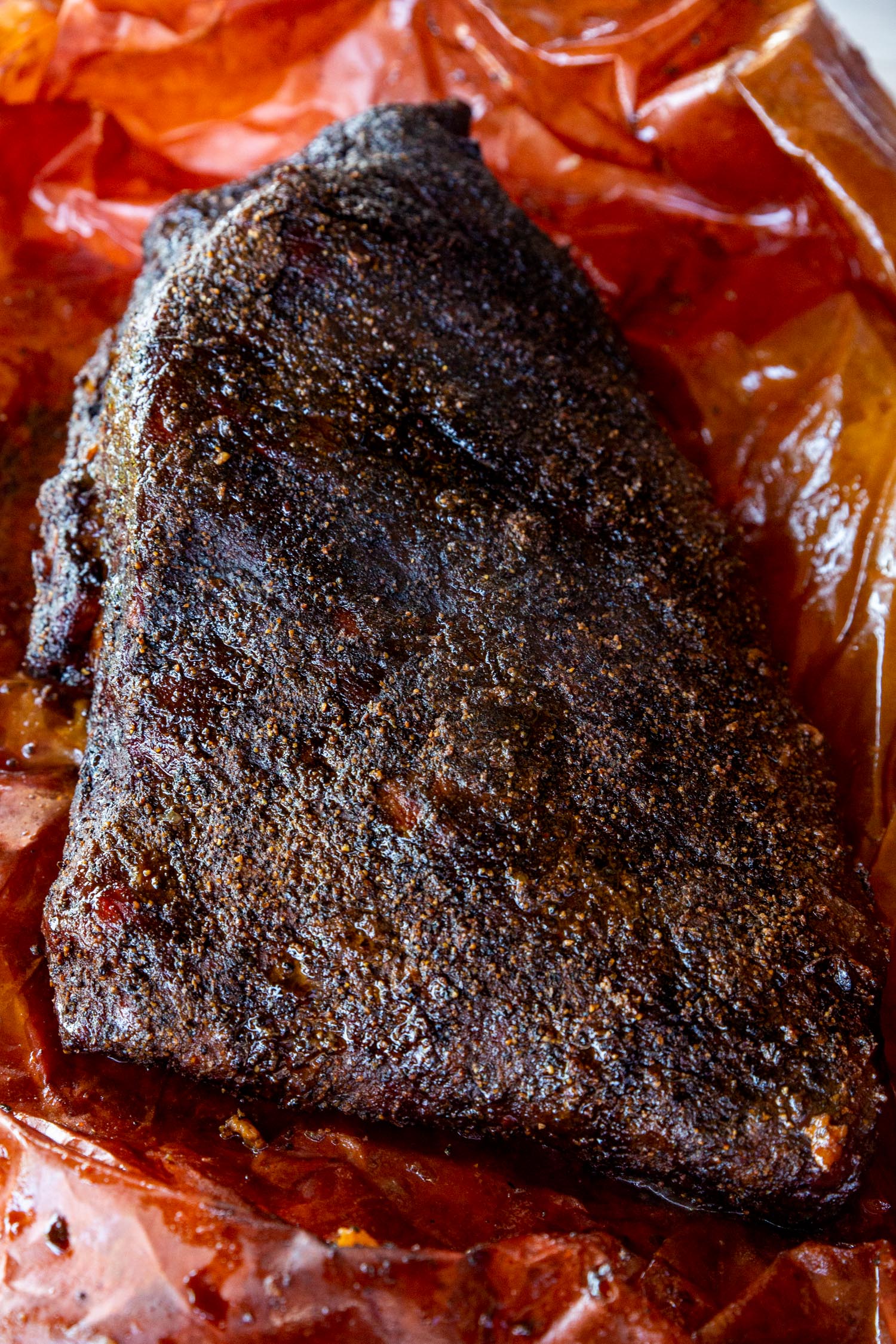 A 10 lb. brisket smoked and in peach butcher paper