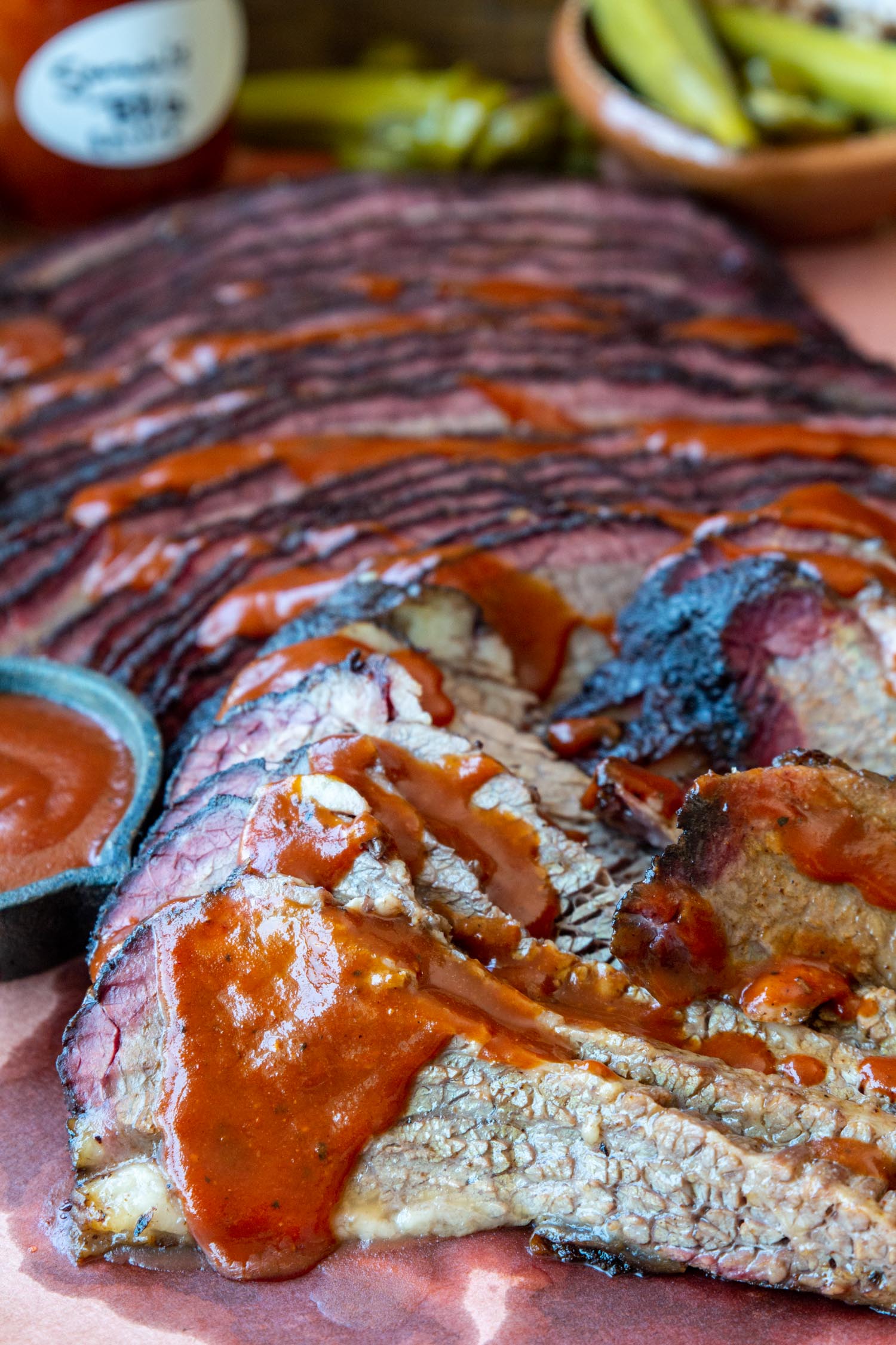 brisket slices laying on butcher paper