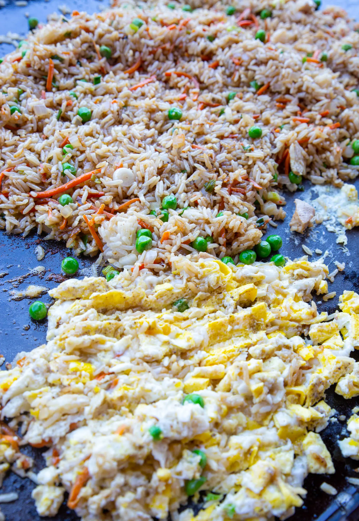 fried rice with egg cooking