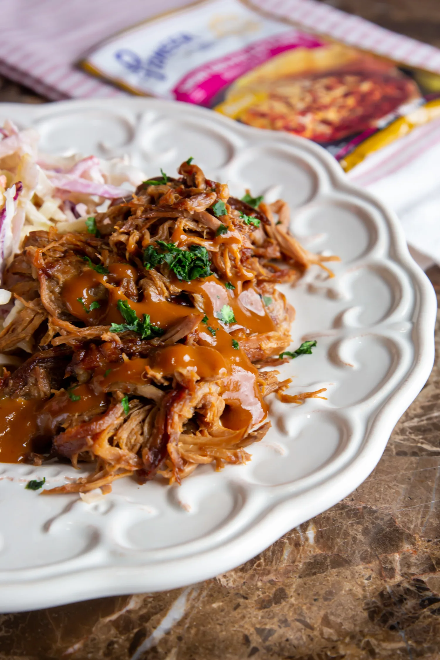 a plate of pulled pork and coleslaw