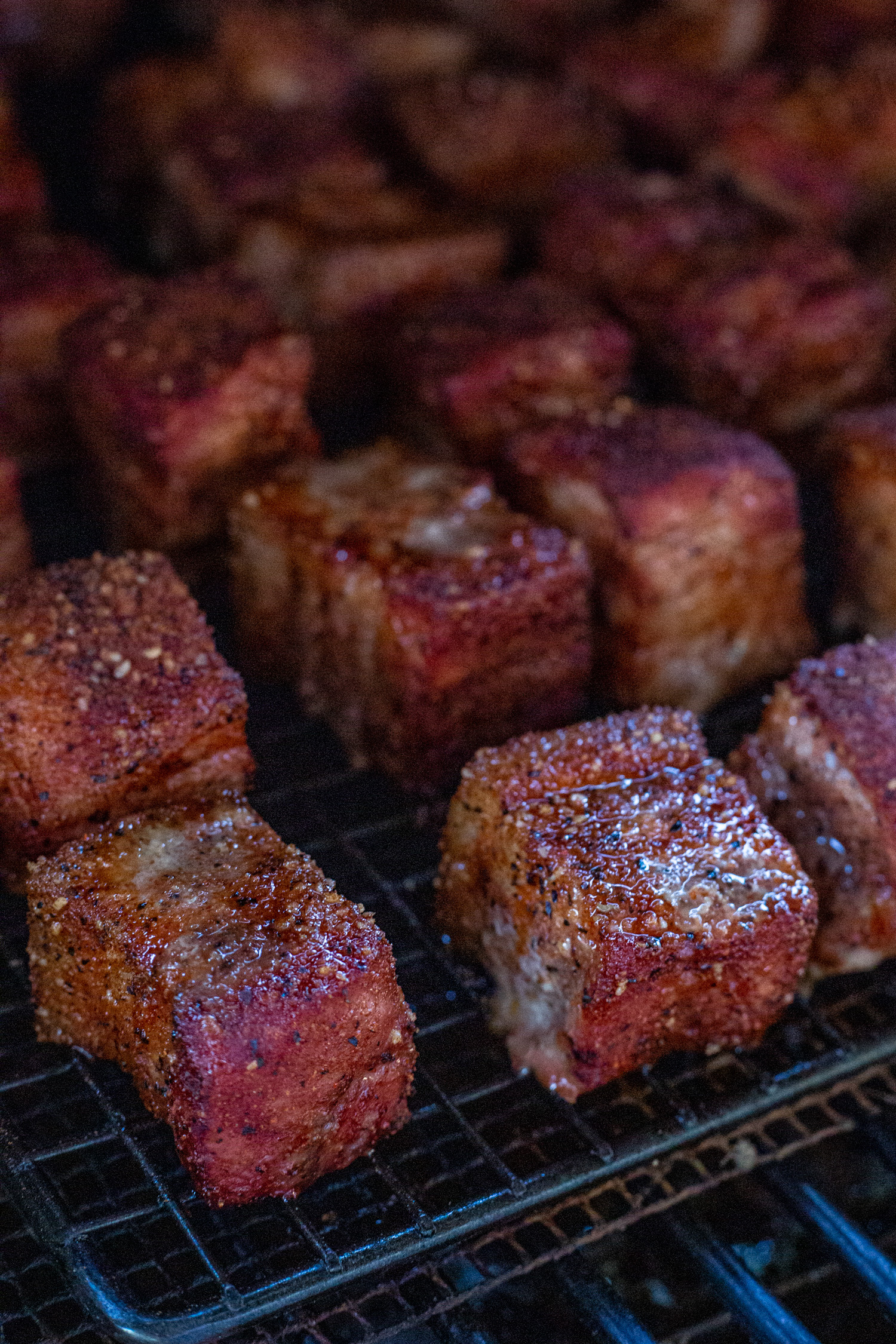 smoked pork belly in a barbecue smoker