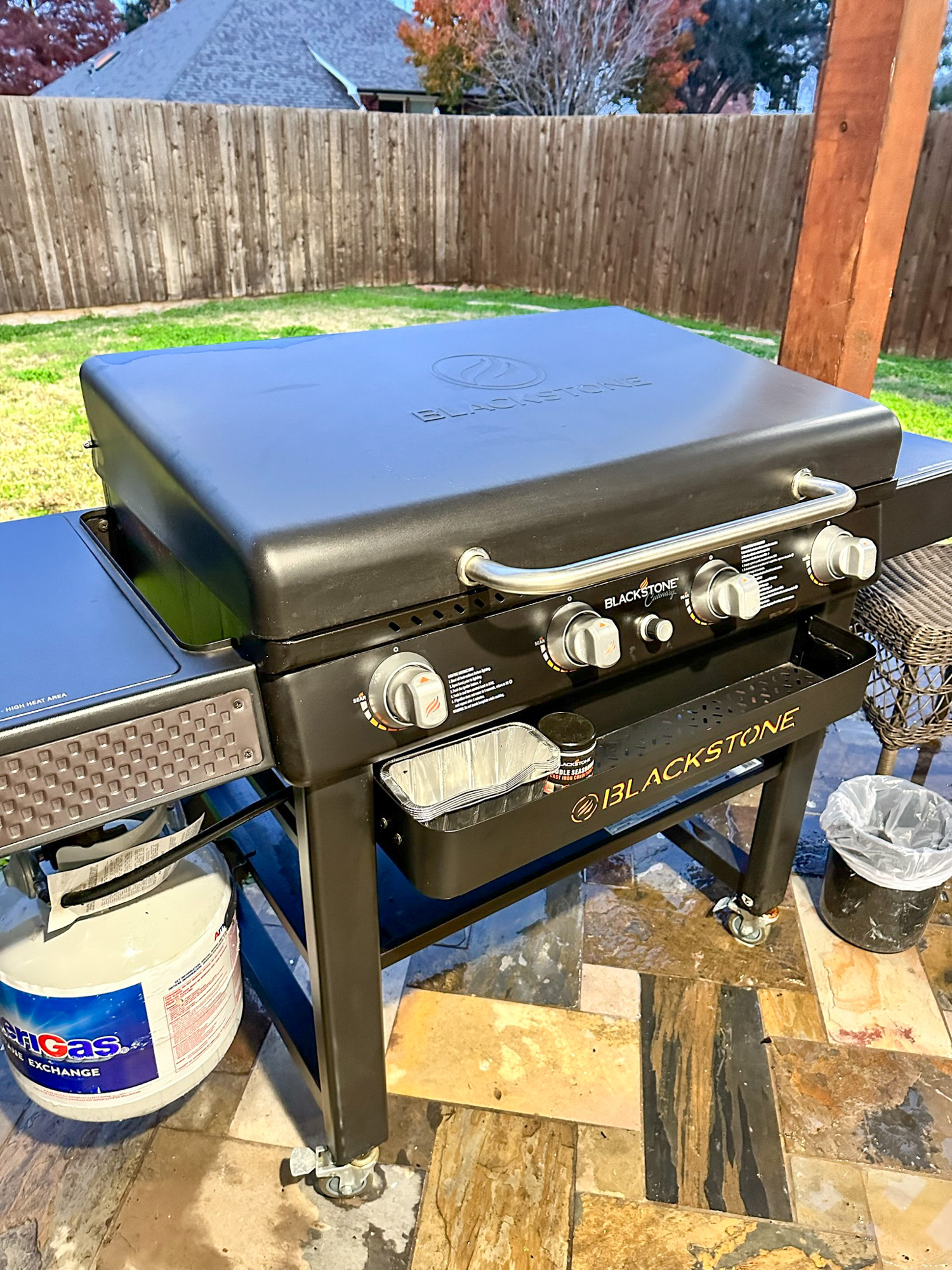 A clean and properly oiled Blackstone Griddle on a porch.