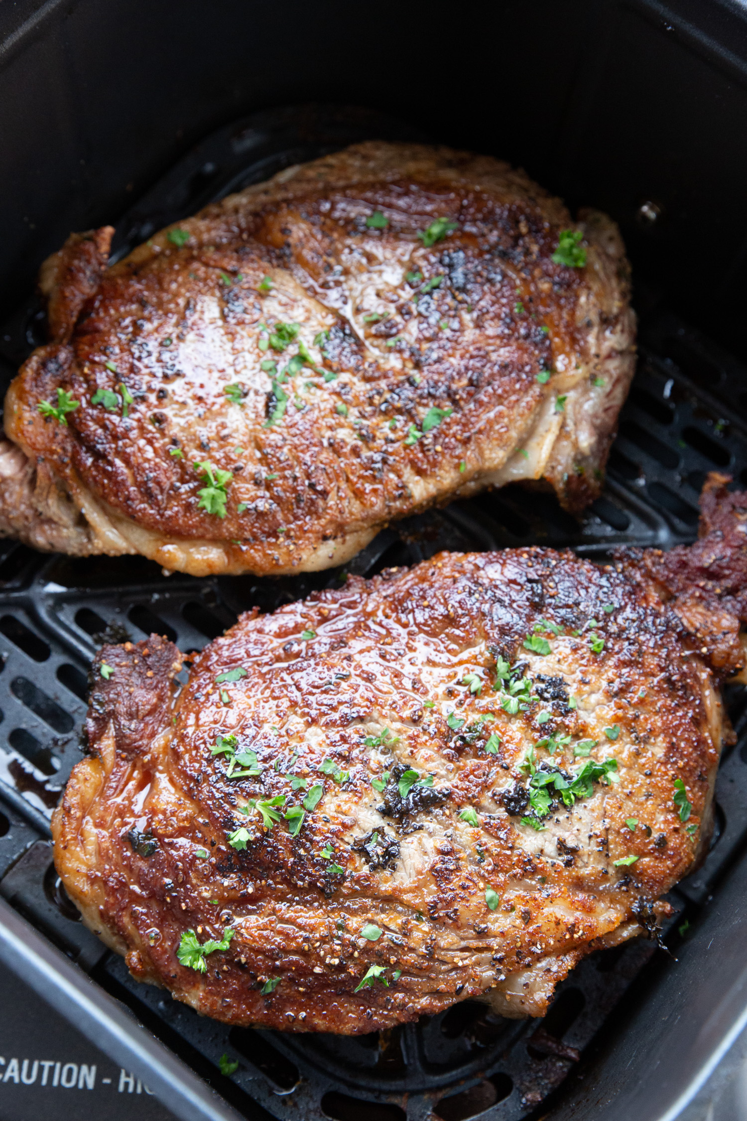 Juicy freshly cooked steaks from the air fryer.