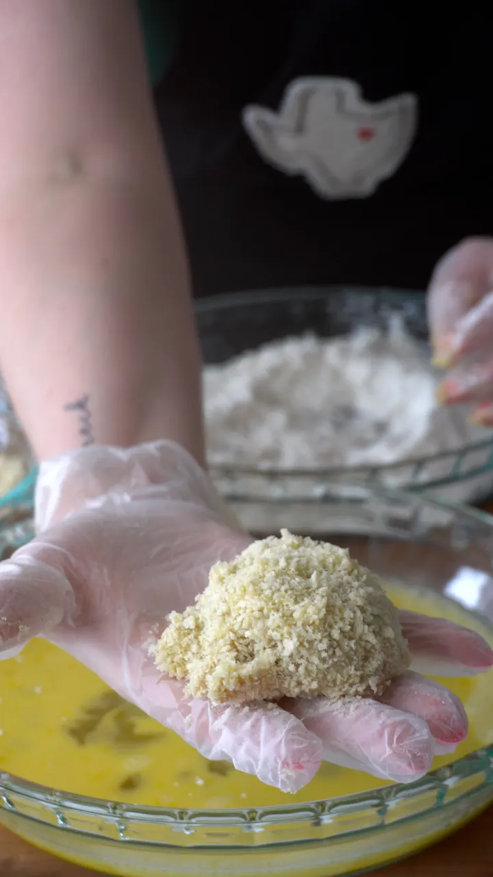 the breading station for gumbo balls: flour, egg wash, and panko bread crumbs