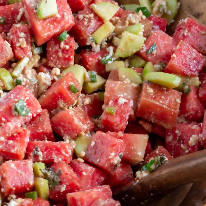 watermelon and balsamic salad in a wooden bowl