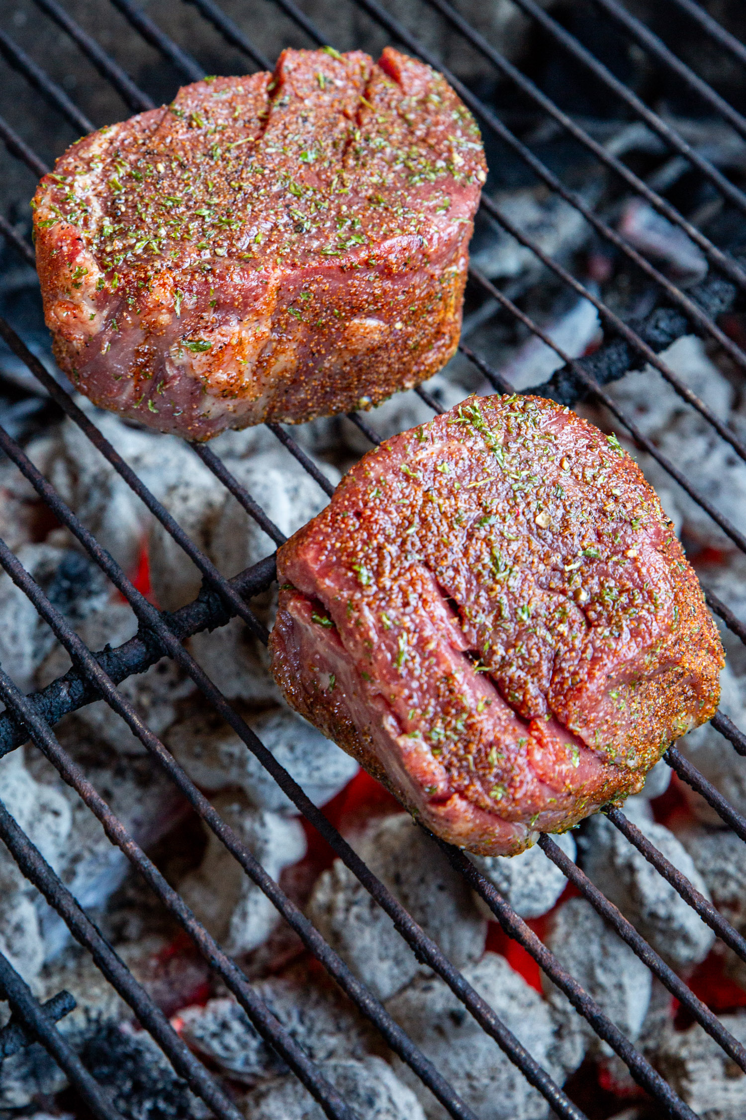 2 inch thick filet mignon steaks over red hot coals