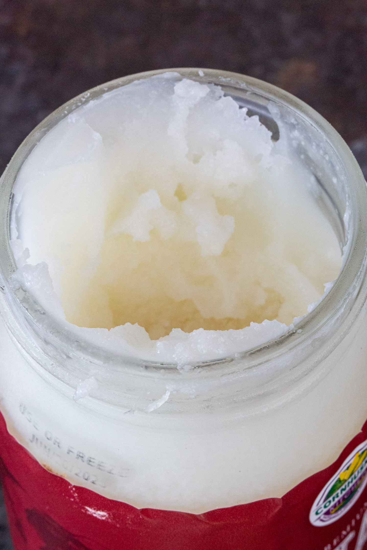 beef tallow up close in a glass jar