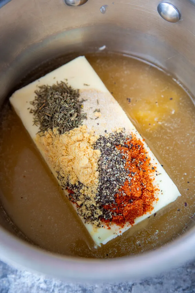 butter in a pot with turkey herbs and spices