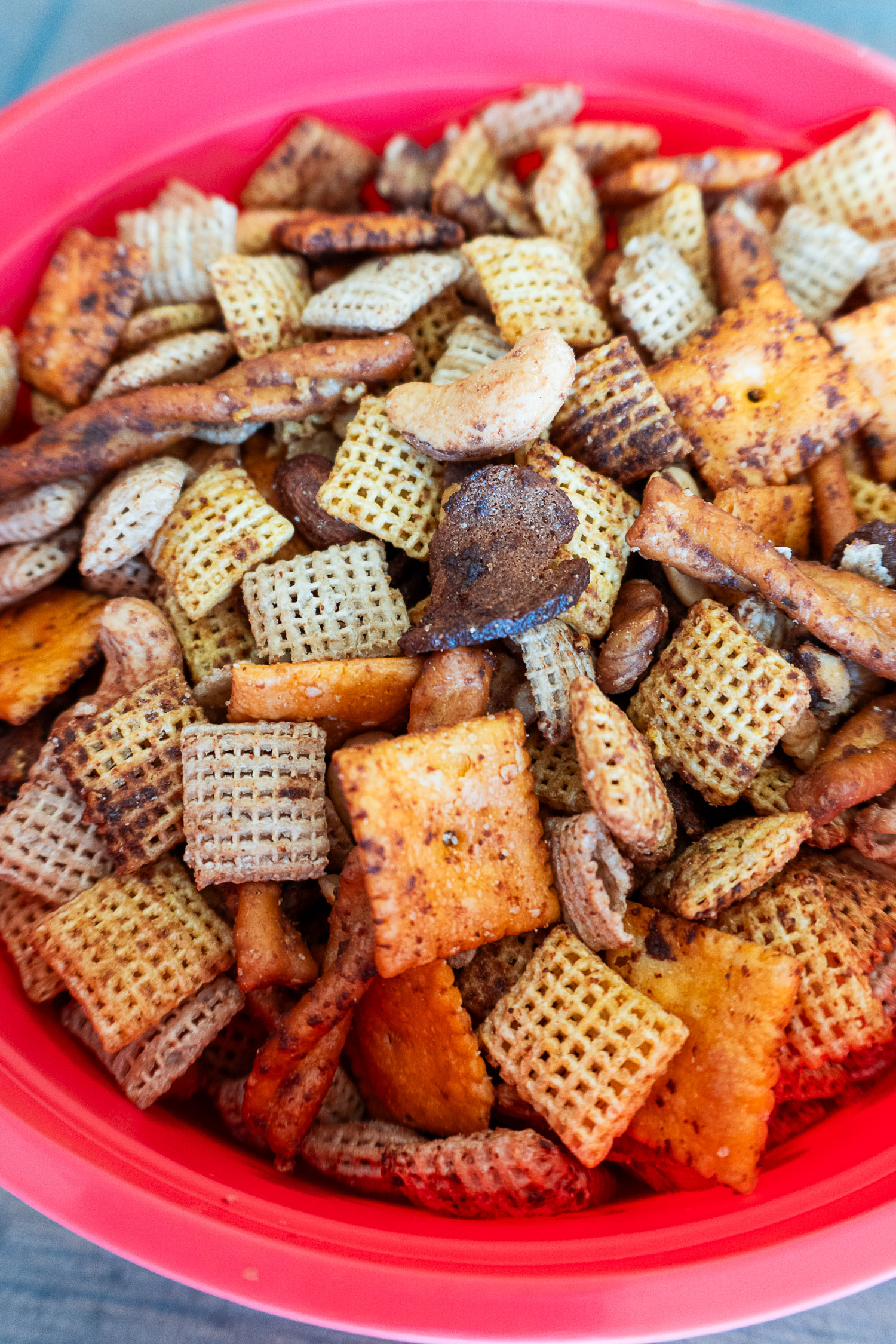 a close up container of prepared classic chex mix