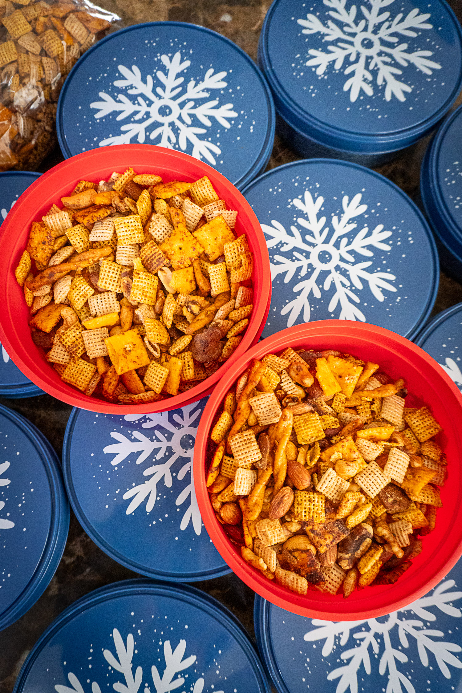 containers of chex mix brightly colored